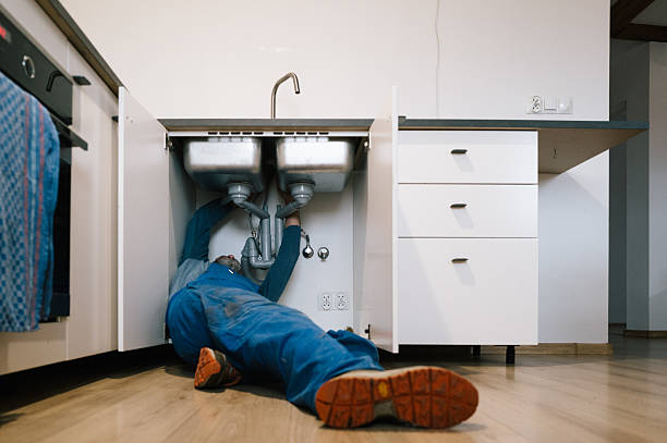 Professional Drain Cleaning technician working in Washburn, WI
